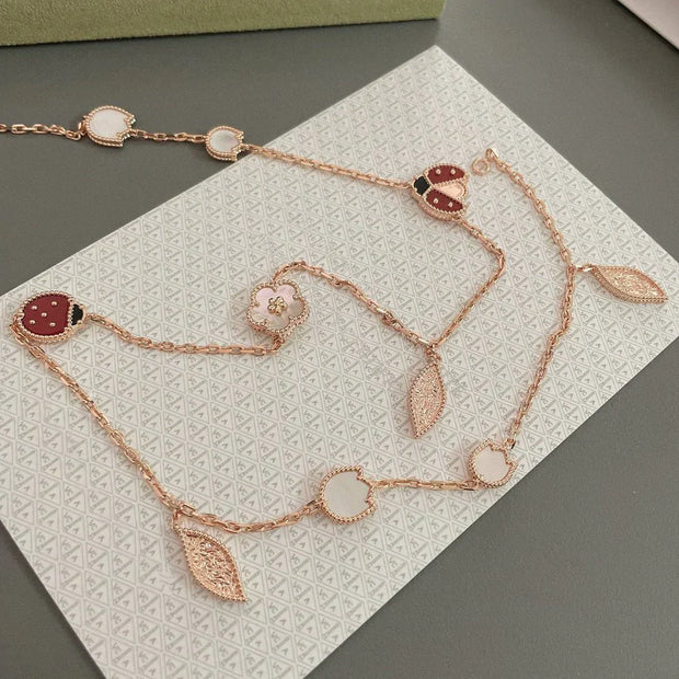 LUCKY SPRING 15 MOTIFS PINK GOLD NECKLACE