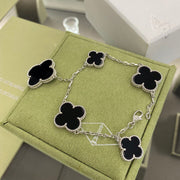 CLOVER 5 MOTIFS SILVER ONYX BRACELET