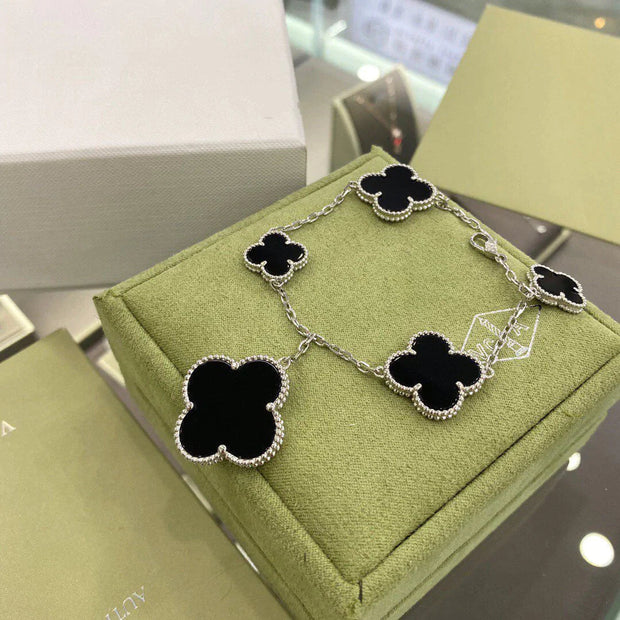 CLOVER 5 MOTIFS SILVER ONYX BRACELET